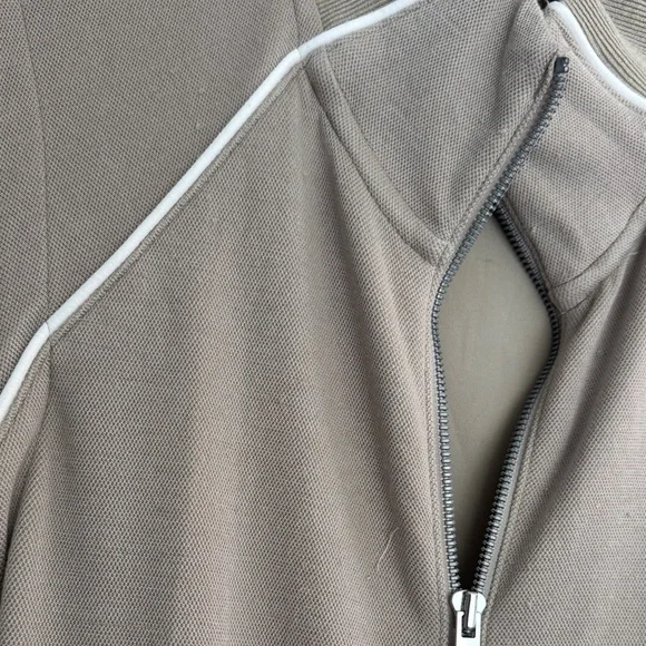 SPANX AirEssentials Sleeveless Wide-Leg Jumpsuit in Taupe with White Piping - Picture 6 of 9